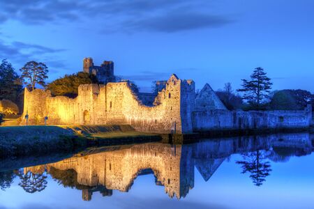 Ruins of the castle in Adare at night, Co. Limerick, Irelandの写真素材