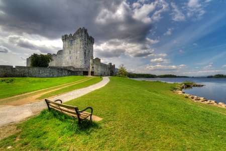 Ross Castle with empty bench near Killarney, Co. Kerry, Irelandの写真素材