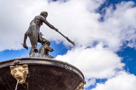 Fountain of the Neptune in old town of Gdansk, Polandの写真素材