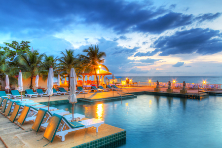 Sunset at swimming pool of Andaman Princess Resort & Spaのeditorial素材
