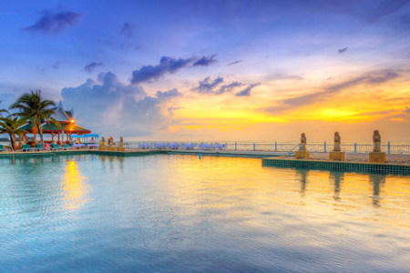 Sunset at swimming pool of Andaman Princess Resort & Spaのeditorial素材