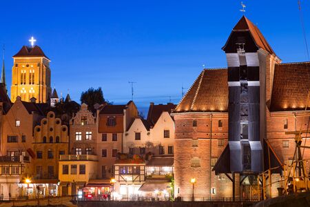 Old town of Gdansk with ancient crane at night, Polandの写真素材