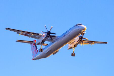 Eurolot aircraft landing on Lech Walesa Airport in Gdanskのeditorial素材