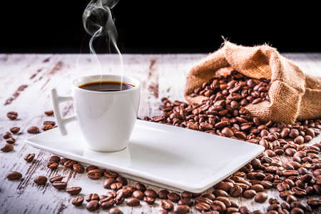 Cup of hot coffee on the tableの写真素材