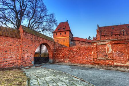 The Castle of the Teutonic Order in Malbork at sunset, Polandのeditorial素材