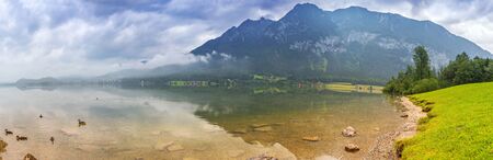Panorama of Alps mountains on a cloudy day in Austriaの写真素材