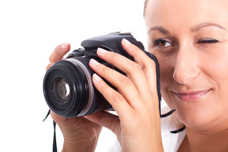Woman photographer holding the cameraの写真素材