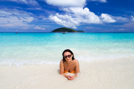 Woman posing on the beachの写真素材