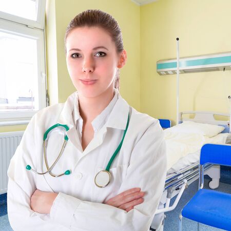 Female doctor with stethoscope in hospitalの写真素材