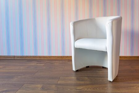 Single-seated armchair in bright baby roomの写真素材