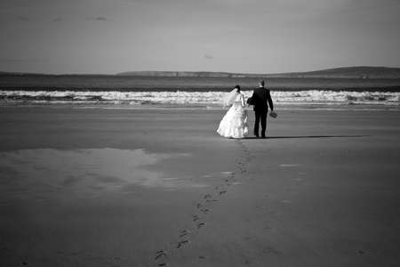 Married couple on the beachの写真素材