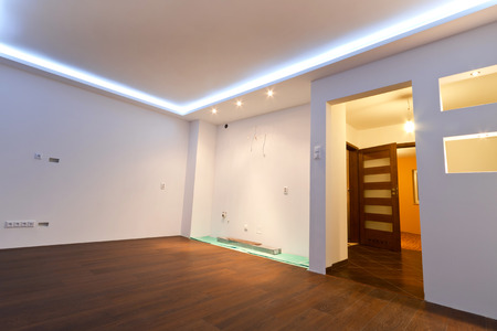 Modern apartment interior with LED ceiling lightsの写真素材