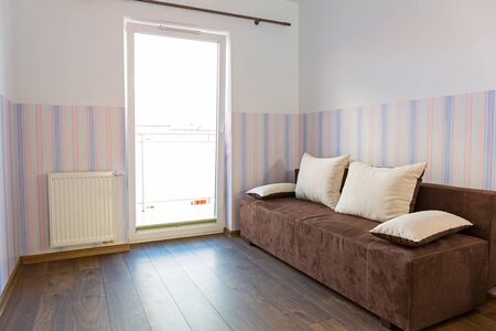 Bright baby room with pastel colour wallpaperの写真素材