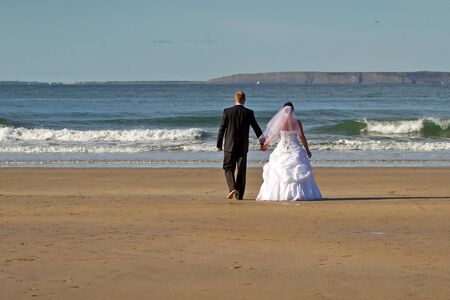 Married couple on the beachの写真素材