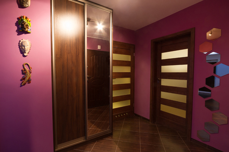 Purple hall interior with brown tilesの写真素材