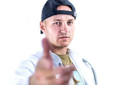 Portrait of young man in sport hat over whiteの写真素材