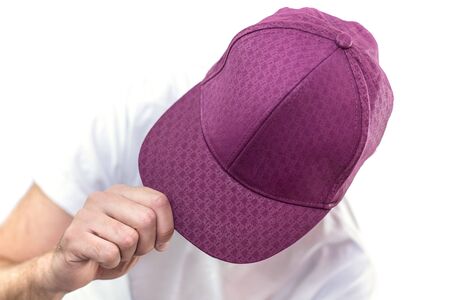 Top view of a man holding his capの写真素材