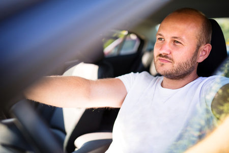 Man driving a carの写真素材