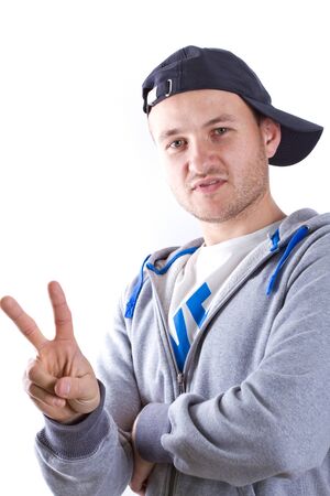 Young man posing a peace gestureの写真素材