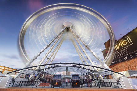 GDANSK, POLAND - 21 JUNE 2016: Ferris wheel in the city centre of Gdansk at night. Gdansk is the historical capital of Polish Pomerania with medieval old town architecture.のeditorial素材
