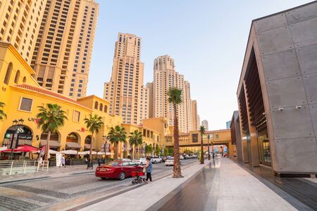 DUBAI, UAE - MARCH 30: City scenery of Dubai Marina at night on March 30, 2014, UAE. Dubai Marina is a district in Dubai with artificial canal skyscrapers who accommodates more than 120,000 people.のeditorial素材
