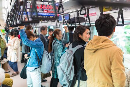 YOKOHAMA, JAPAN - NOVEMBER 7, 2016: People traveling by very popular Municipal Subway in Yokohama, Japan. Yokohama Municipal Subway is the metro network in the city of Yokohama, Japanのeditorial素材
