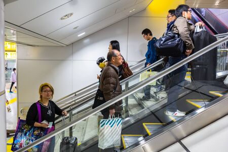TOKYO, JAPAN - NOVEMBER 12, 2016: People traveling by very popular Tokyo Metro in the capital of Japan. Tokyo Metro had an average daily ridership of 6,84 million passengers.のeditorial素材