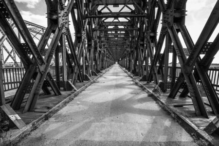 Old railway bridge over Vistula river in Tczew, Polandの写真素材
