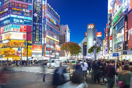 TOKYO, JAPAN - NOVEMBER 12, 2016: Shibuya scramble crossing in Tokyo at night, Japan. Shibuya Crossing is one of the busiest crosswalks in the world.のeditorial素材