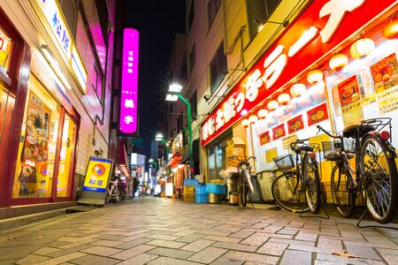 TOKYO, JAPAN - NOVEMBER 13, 2016: Cityscape of Ikebukuro district in Tokyo at night, Japan. Tokyo Metropolis is both the capital and most populous city of Japan.のeditorial素材