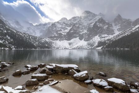 Beautiful winter at Eye of the Sea lake in in Tatra mountains, Polandの写真素材