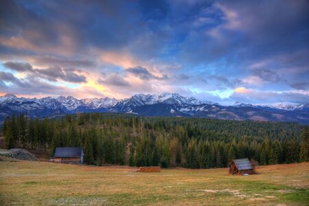 Beautiful sunrise over Tatra mountains in winter, Polandの写真素材