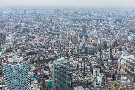TOKYO, JAPAN - NOVEMBER 14, 2016: Aerial view for Tokyo metropolis from 60th floor of Sunshine city skyscraper, Ikebukuro, Japan. Tokyo Metropolis is both the capital and most populous city of Japan.のeditorial素材