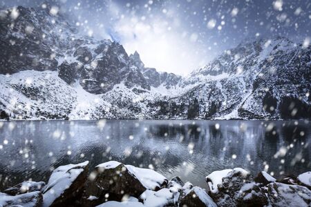 Snowy winter at Eye of the Sea lake in Tatra mountains, Polandの写真素材