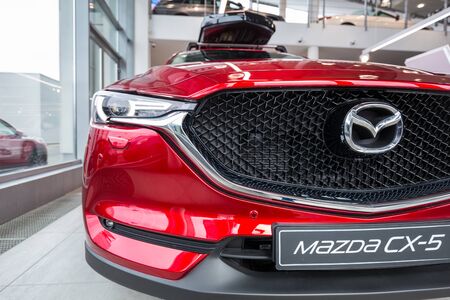 GDANSK, POLAND - FEBRUARY 13, 2018: Mazda CX-5 in the car showroom of Gdansk, Poland. Mazda CX-5 is a popular SUV car manufactured in Japan by the Mazda Motor Corporation.のeditorial素材