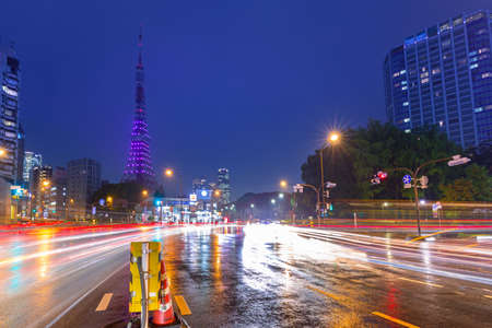 Tokyo, Japan - November 14, 2016: Cityscape of Tokyo with traffic lights and illuminated Tokyo tower, Japan. Tokyo Metropolis is both the capital and most populous city of Japan.のeditorial素材