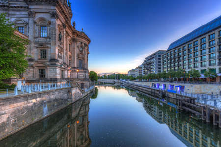 Architecture of Berlin reflected in Spree River, Germanyの写真素材