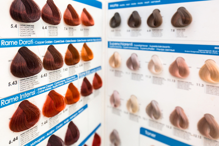 Pruszcz Gdanski, Poland - April 22, 2018: Hair colors sample set in the hairdresser salon with color symbols.のeditorial素材