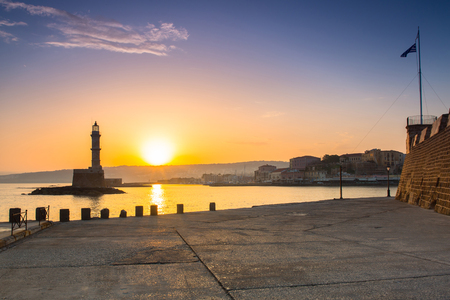 Lighthouse of the old Venetian port in Chania at sunrise, Crete. Greeceの写真素材