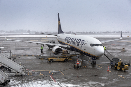 Gdansk, Poland - January 19, 2018: Preparing for boarding to Ryanair plane on Lech Walesa Airport in Gdansk. Ryanair operates over 300 aircraft and is the biggest low-cost airline company in Europeのeditorial素材
