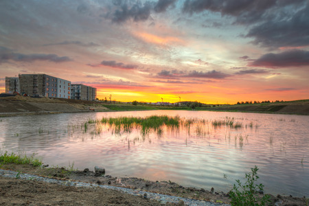 Amazing sunset over the pond in Polandの写真素材