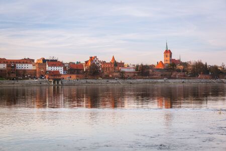 Torun old town reflected in Vistula river, Polandの写真素材