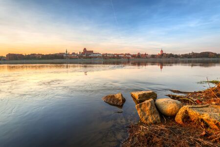 Amazing sunset over Vistula river in Torun, Polandの写真素材