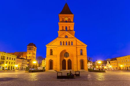 Beautiful architecture of the old town in Torun at dusk, Poland.の写真素材