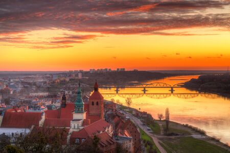 Old town of Grudziadz and the Vistula River at sunset. Kuyavian-Pomeranian Voivodeship, Poland.の写真素材