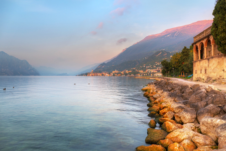 Beautful coastline of Garda lake at sunset, northern Italyのeditorial素材