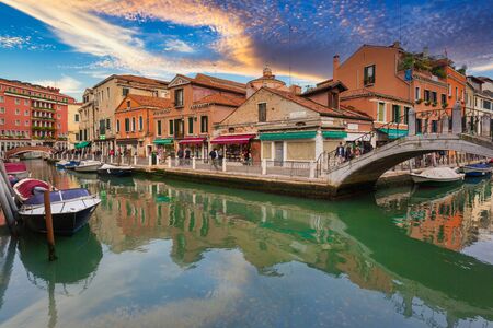 Venice, Italy - October 24, 2019: Canals of Venice city with boats and traditional colorful architecture, Italyのeditorial素材