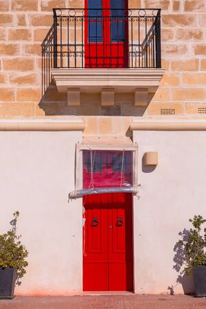Colorful doors and windows of traditional Maltese housesの写真素材