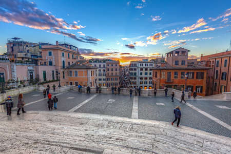 Rome, Italy - January 10, 2019: Tourists walking on Spanish steps in Rome at sunset, Italyのeditorial素材