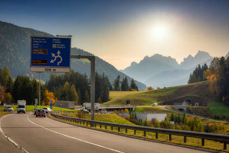South Tyrol, Italy - October 25, 2019: Road through South Tyrol of Italy with a view of the Dolomite peaksのeditorial素材